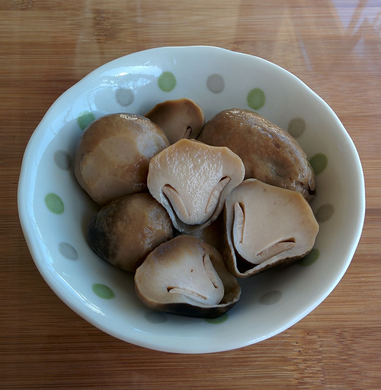 Volvariella volvacea (Paddy Straw Mushroom) — edible, commonly foraged in Southeast Asia